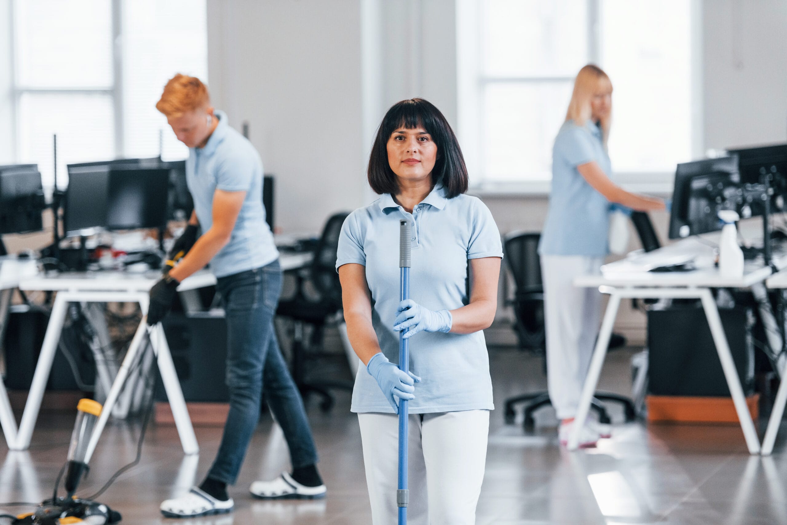 Cleans floor group of workers clean modern office 2025 03 18 20 41 42 utc scaled